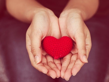 Hand holding crafted heart