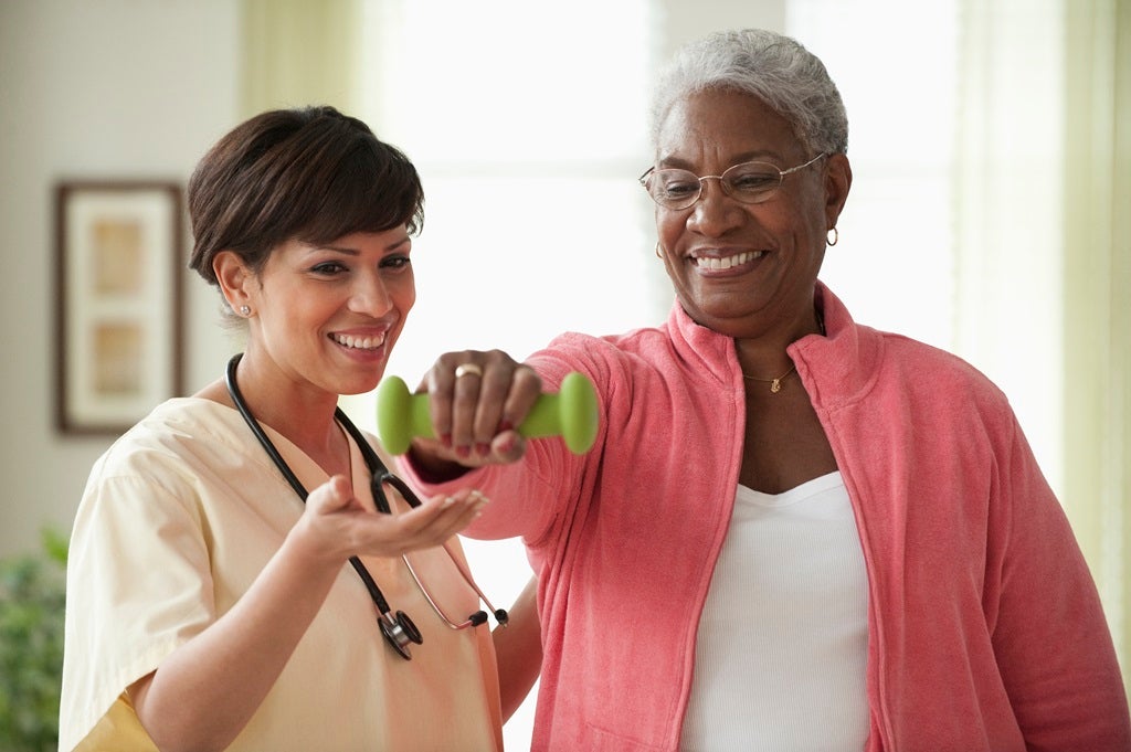 Caregiver helping patient