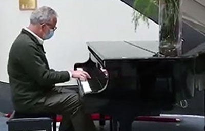 Serving TogetherImage: Mission Moments The Masked Pianist at Saint Francis Hospital and Medical Center 