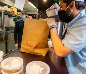 Serving TogetherImage: CDC Offers Safer Ways to Enjoy a Meal from Your Favorite Restaurant