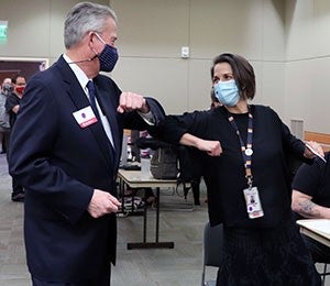 Serving TogetherImage: COVID-19 Vaccinations Begin at Health Ministries